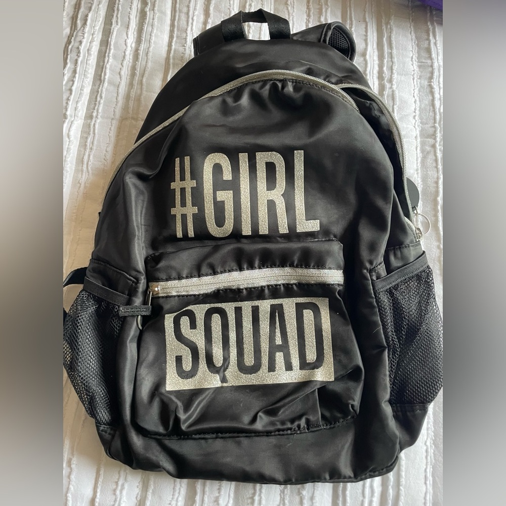 Black and silver school book bag.